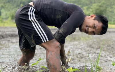 During off-season, midfielder Len Doungel delighted to assist in family's paddy field